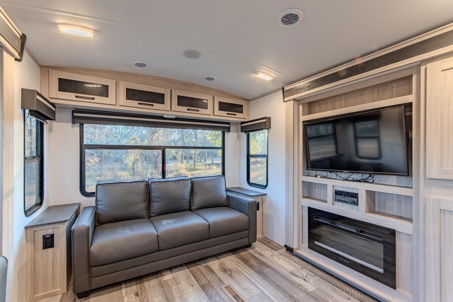 6425 Cravens Road Savannah, TN 38372 - Photo 34 of 39 a living room with furniture and a flat screen tv
