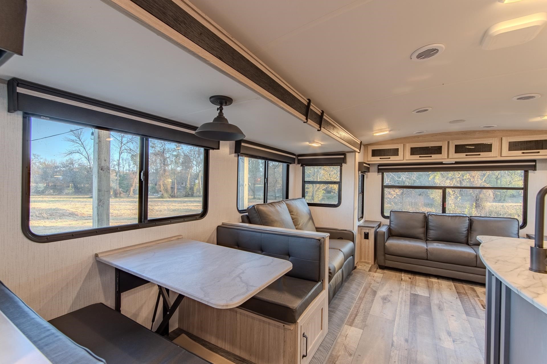 6425 Cravens Road Savannah, TN 38372 - Photo 35 of 39 a living room with furniture and a large window