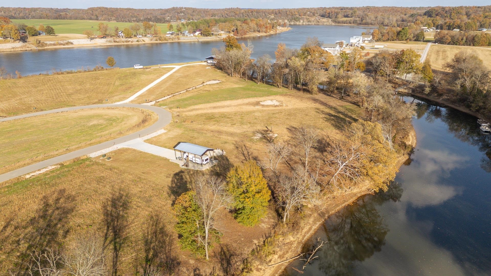 6425 Cravens Road Savannah, TN 38372 - Photo 37 of 39 a view of a lake with mountain