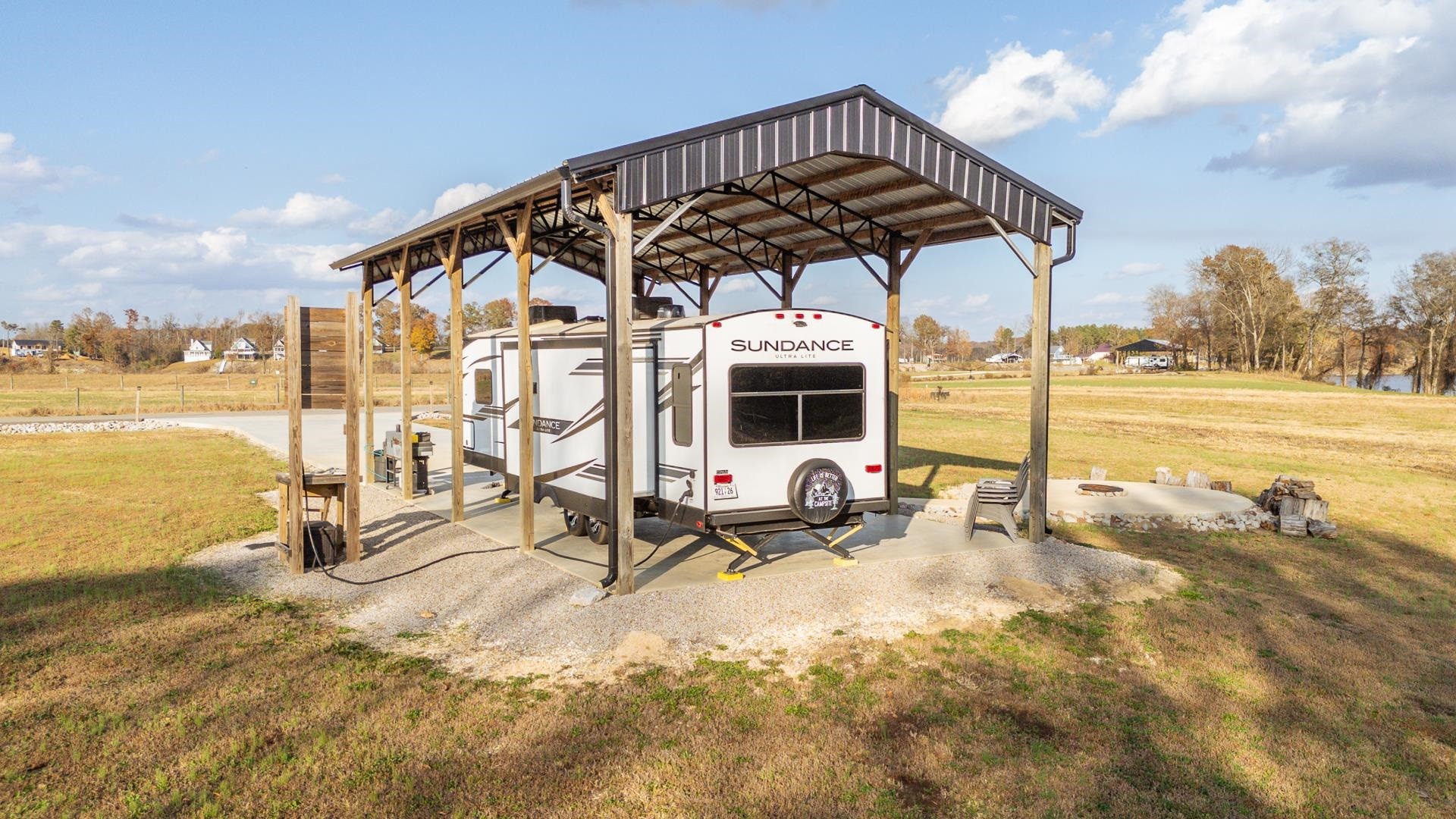 6425 Cravens Road Savannah, TN 38372 - Photo 8 of 39 a view of a swimming pool with lounge chair