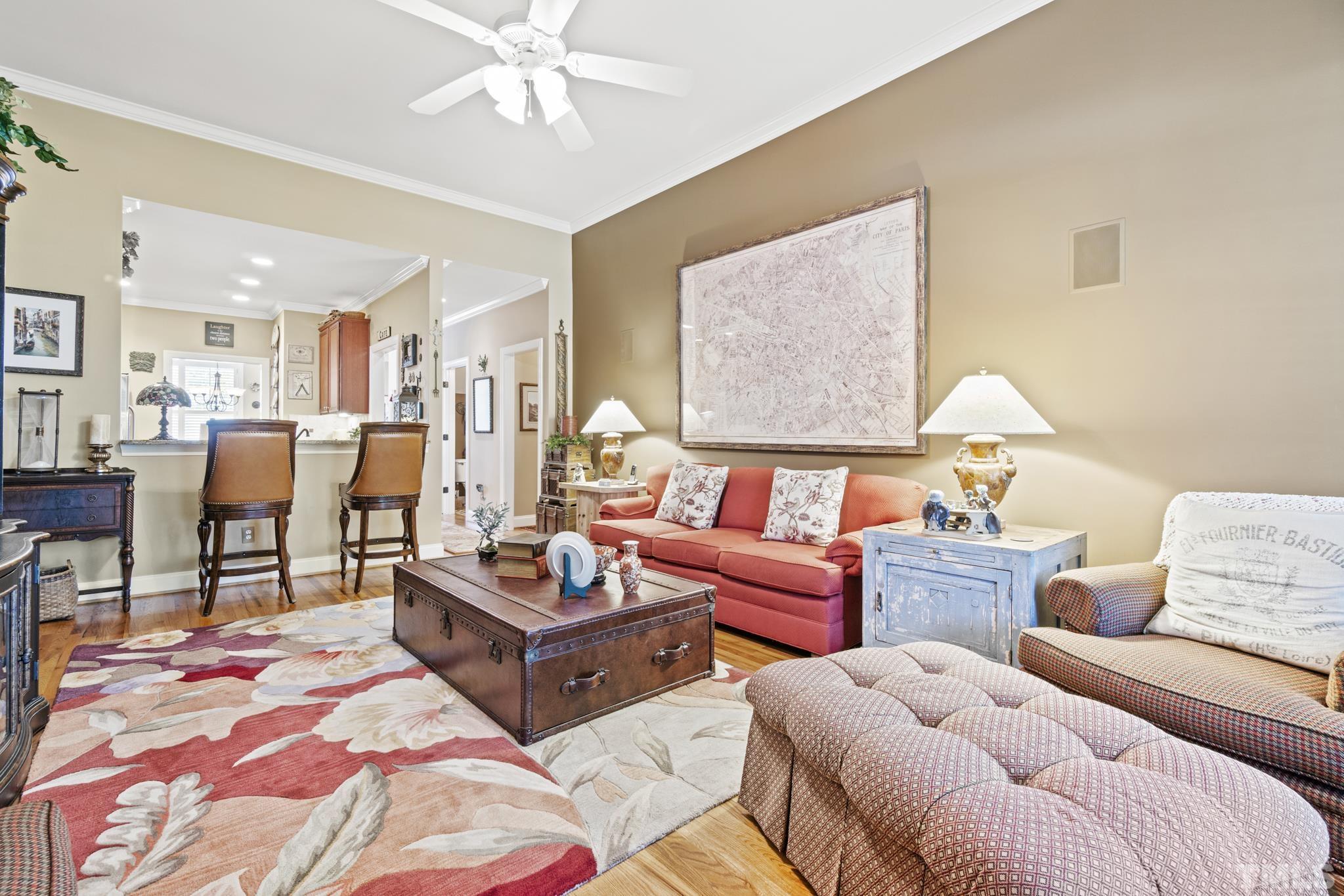 641 Canvas Drive Wake Forest, NC 27587 - Photo 15 of 37 a living room with furniture and a chandelier