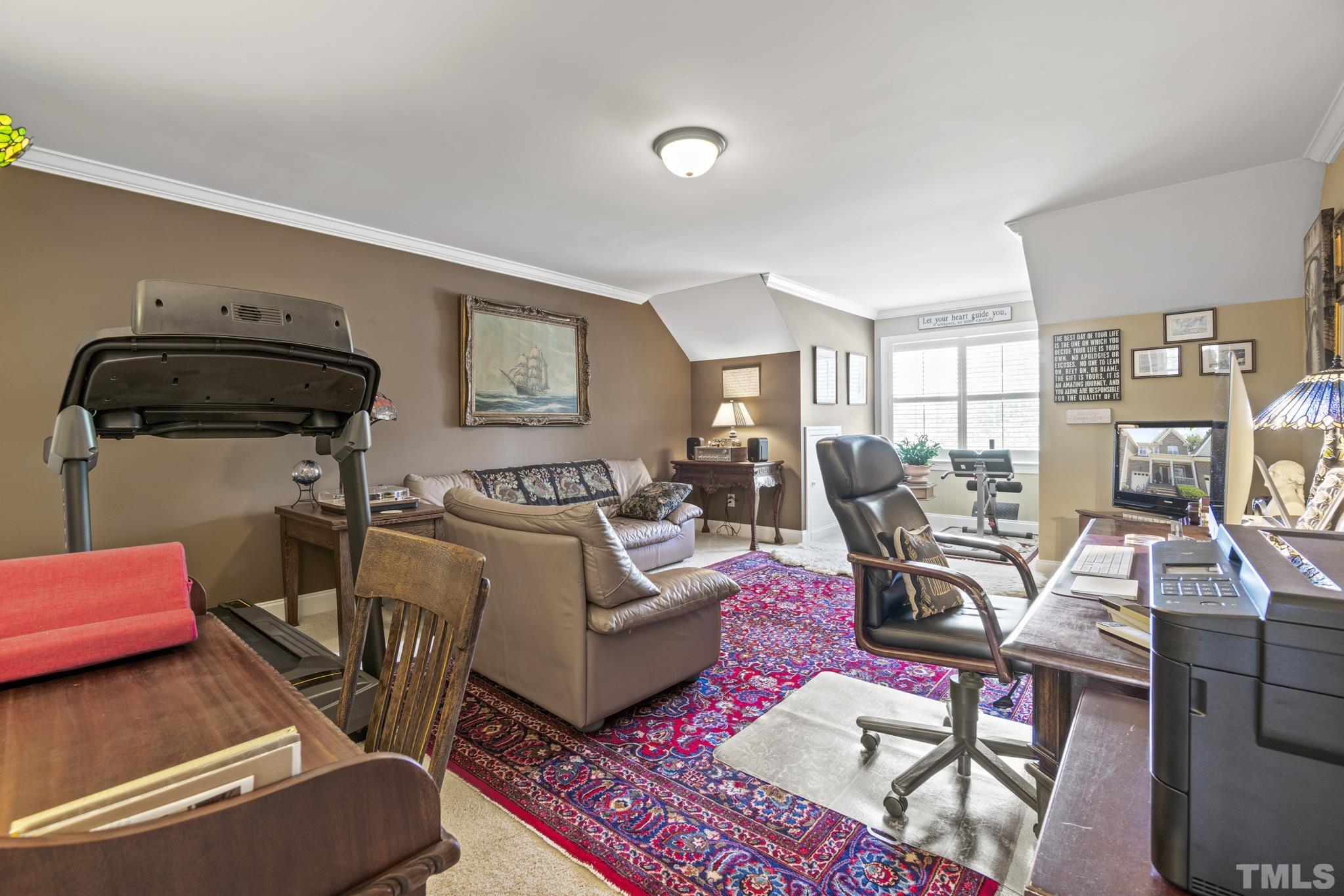 641 Canvas Drive Wake Forest, NC 27587 - Photo 22 of 37 a living room with furniture and a table