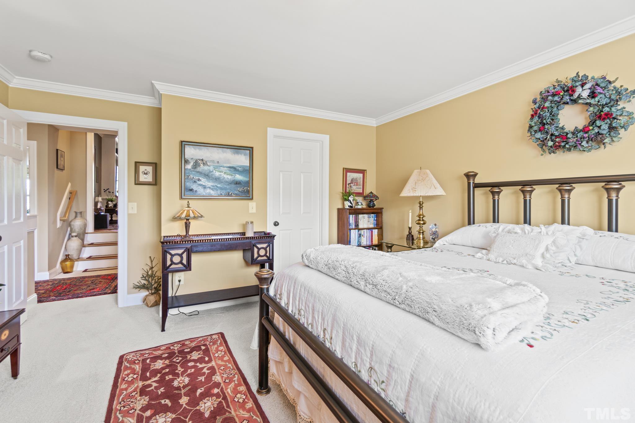 641 Canvas Drive Wake Forest, NC 27587 - Photo 26 of 37 a bedroom with a bed and a window