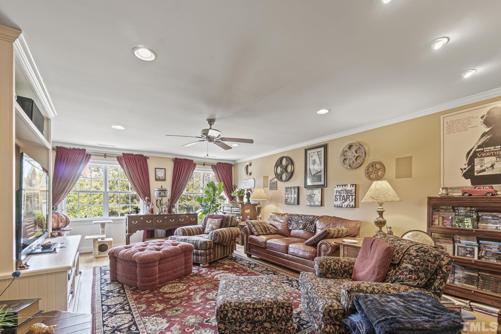 641 Canvas Drive Wake Forest, NC 27587 - Photo 27 of 37 a living room with furniture and a large window