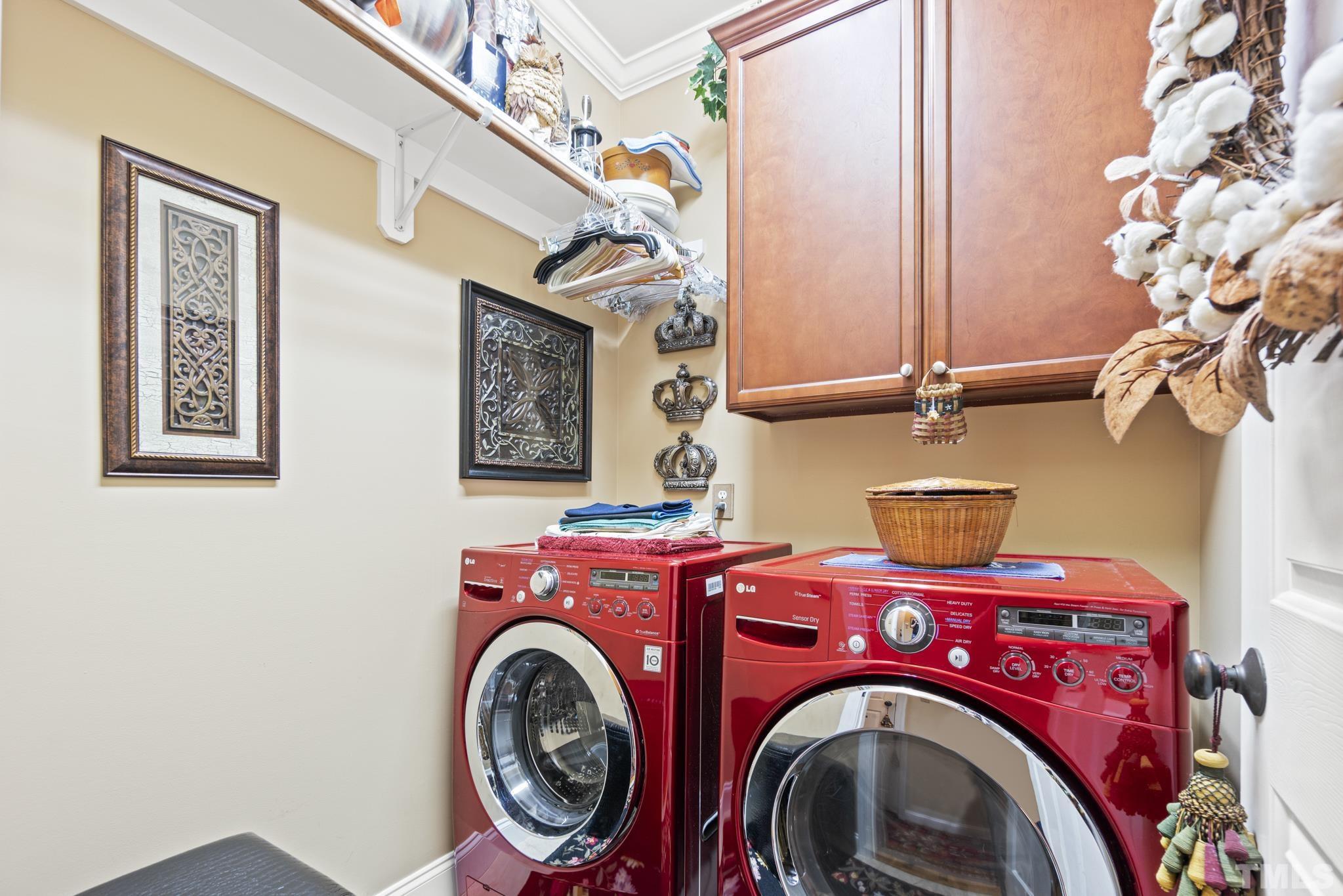 641 Canvas Drive Wake Forest, NC 27587 - Photo 29 of 37 a utility room with dryer and washer