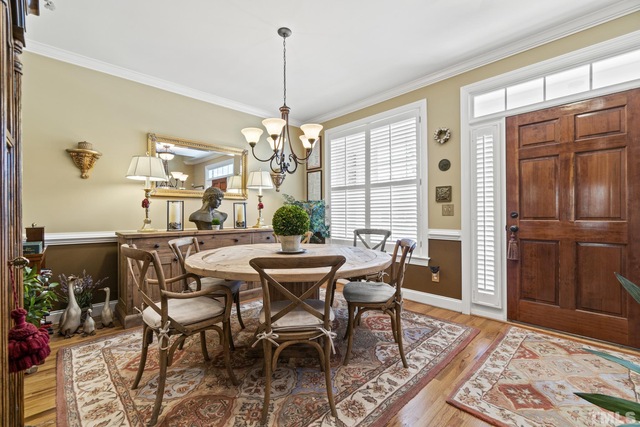 641 Canvas Drive Wake Forest, NC 27587 - Photo 8 of 37 a view of a dining room with furniture