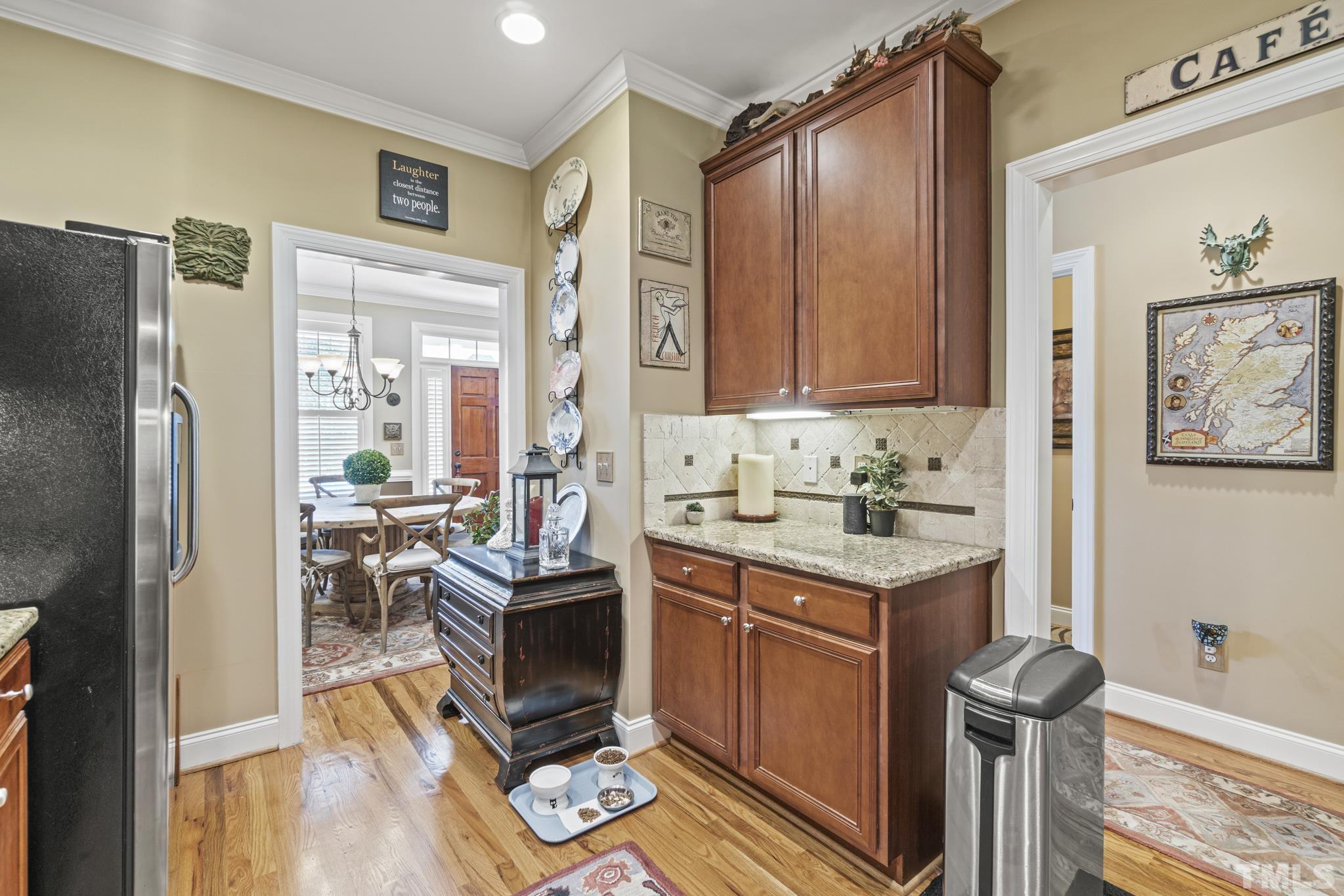 641 Canvas Drive Wake Forest, NC 27587 - Photo 10 of 37 a kitchen with granite countertop a sink appliances and cabinets