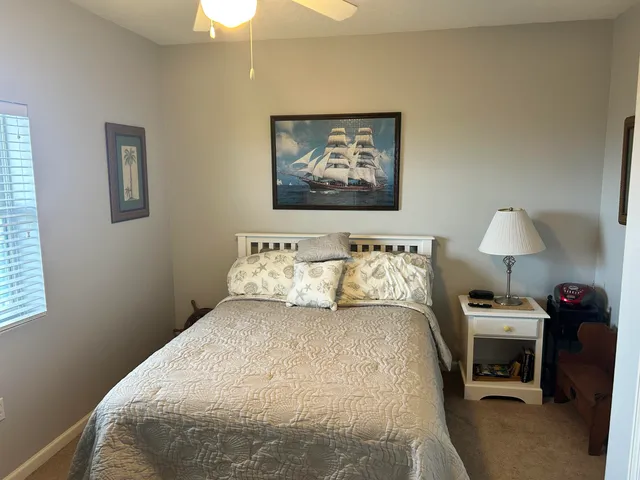 a bathroom with a toilet a sink and shower