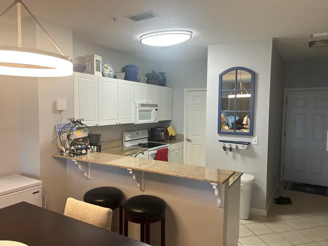 a room with furniture and a flat screen tv