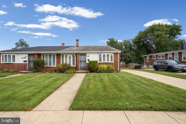 3413 Retlaw Road Baltimore, MD 21207 - Photo 2 of 32 Charming brick home with lush lawn.