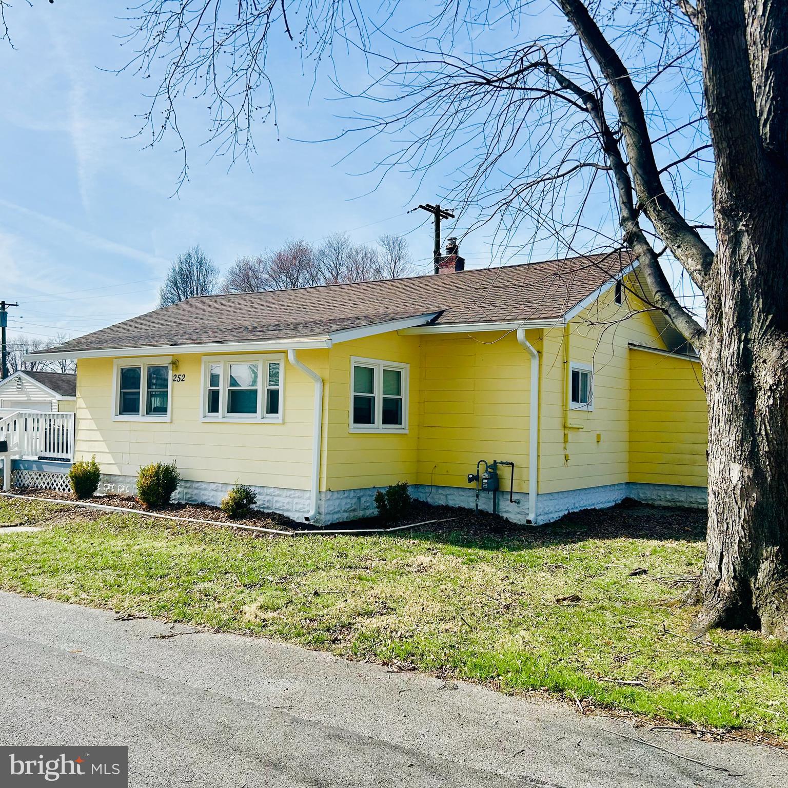 252 G Street Carneys Point, NJ 08069 - Photo 8 of 8 a front view of a house with a yard