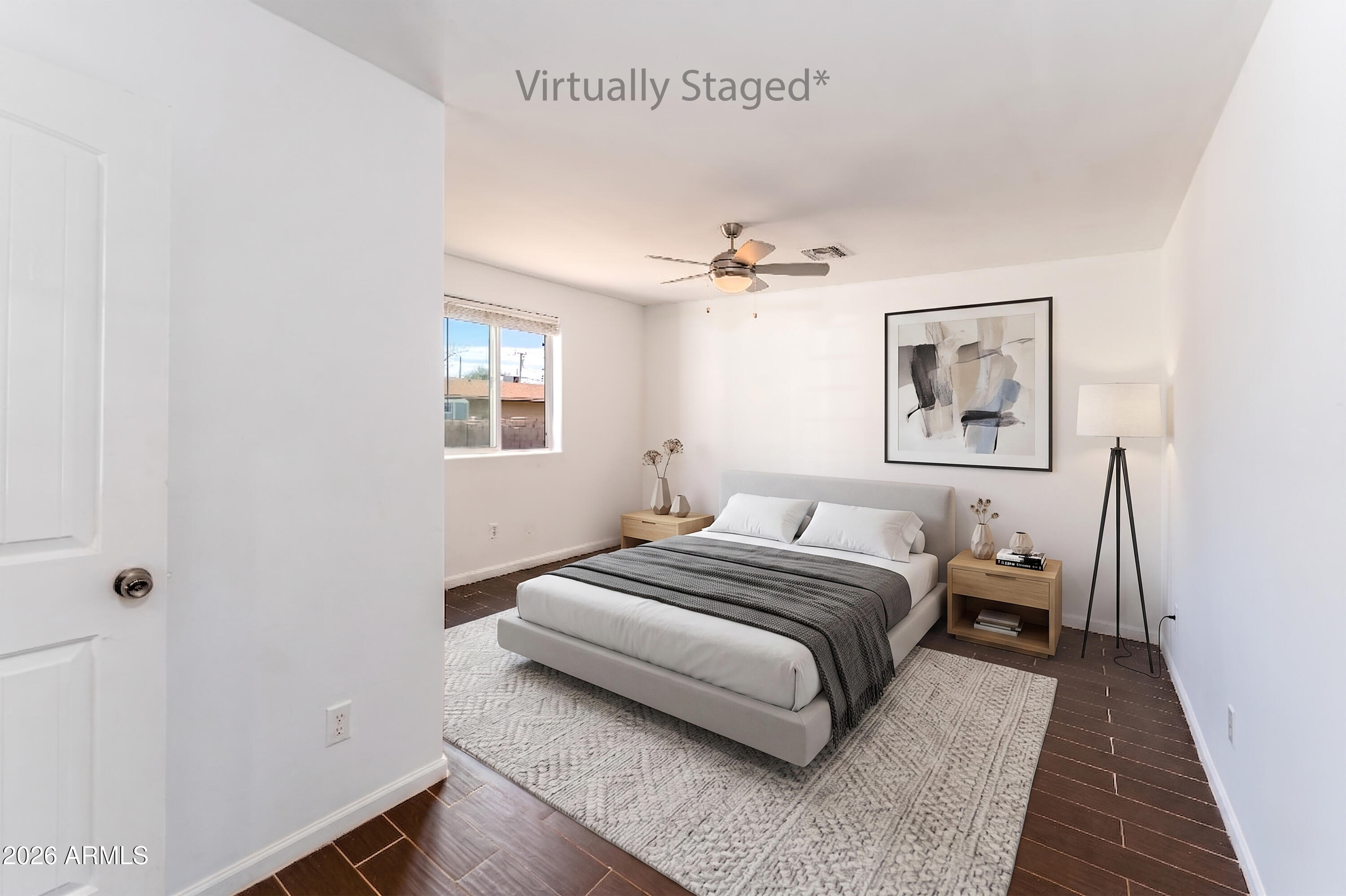 9616 North 11th Avenue Phoenix, AZ 85021 - Photo 11 of 32 a bedroom with a bed and lamp