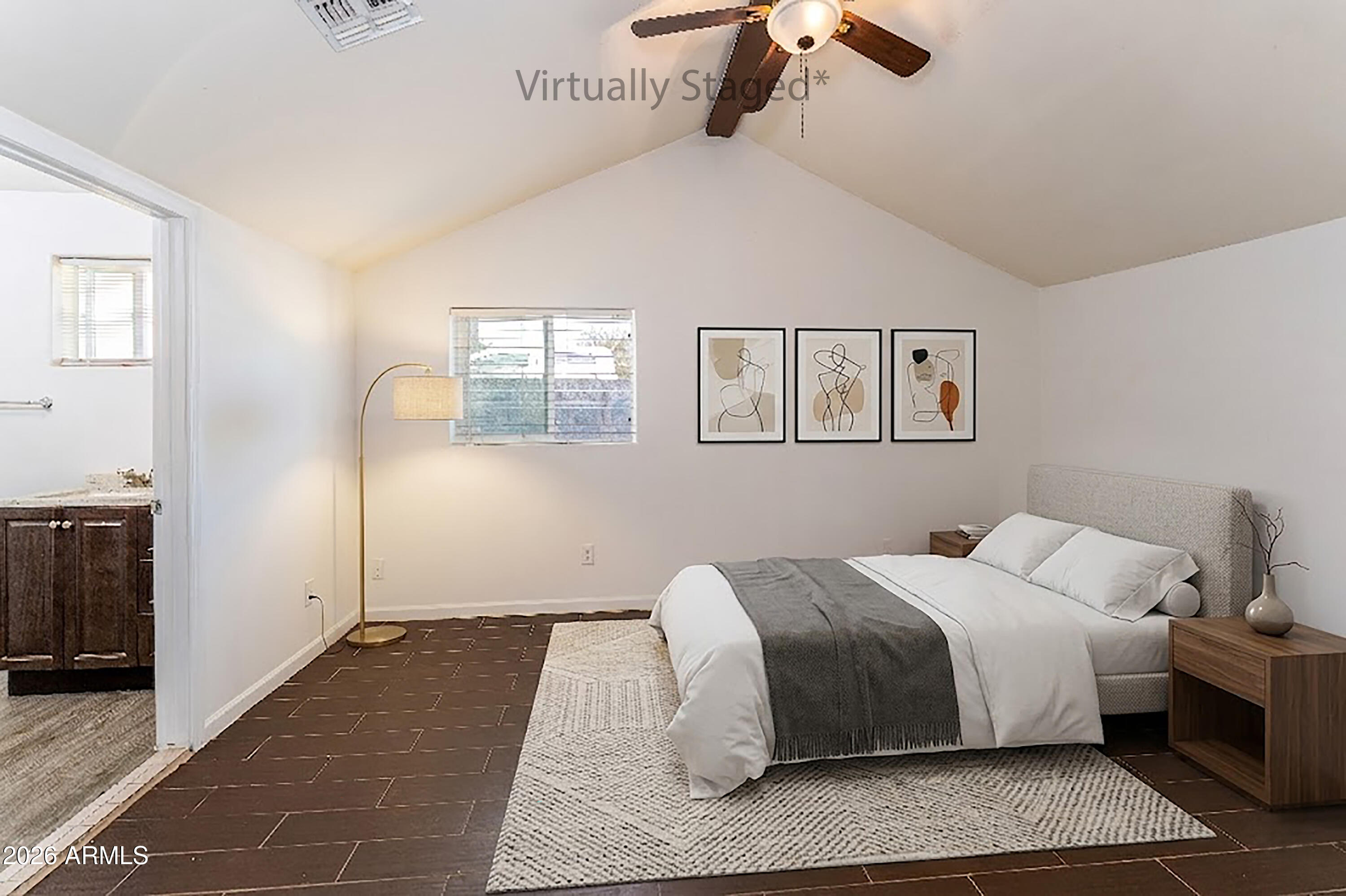 9616 North 11th Avenue Phoenix, AZ 85021 - Photo 14 of 32 a bedroom with a large bed and a chandelier