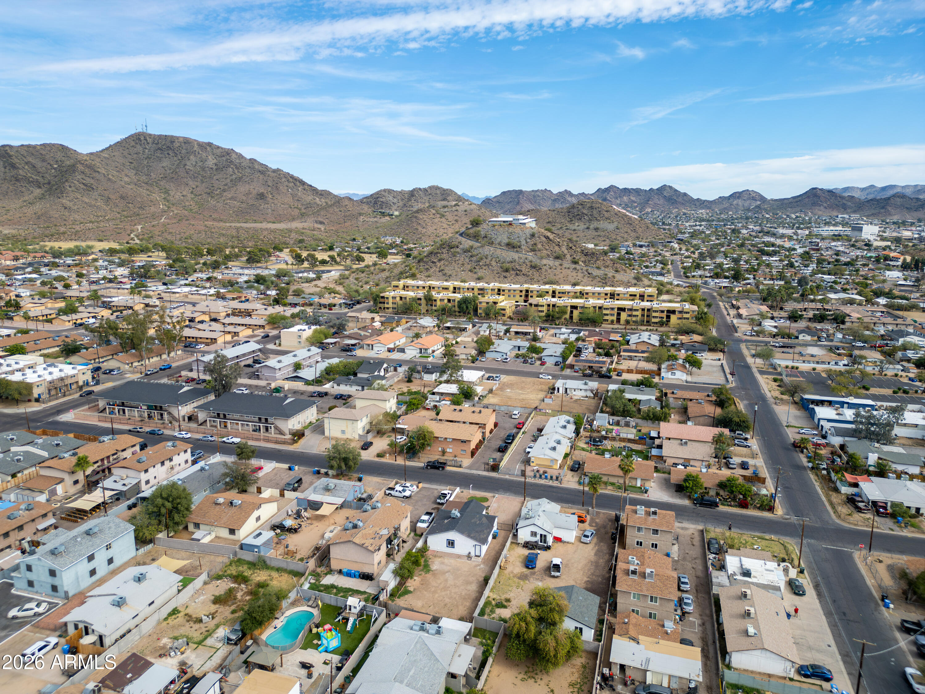 9616 North 11th Avenue Phoenix, AZ 85021 - Photo 17 of 32 an aerial view of residential houses with outdoor space