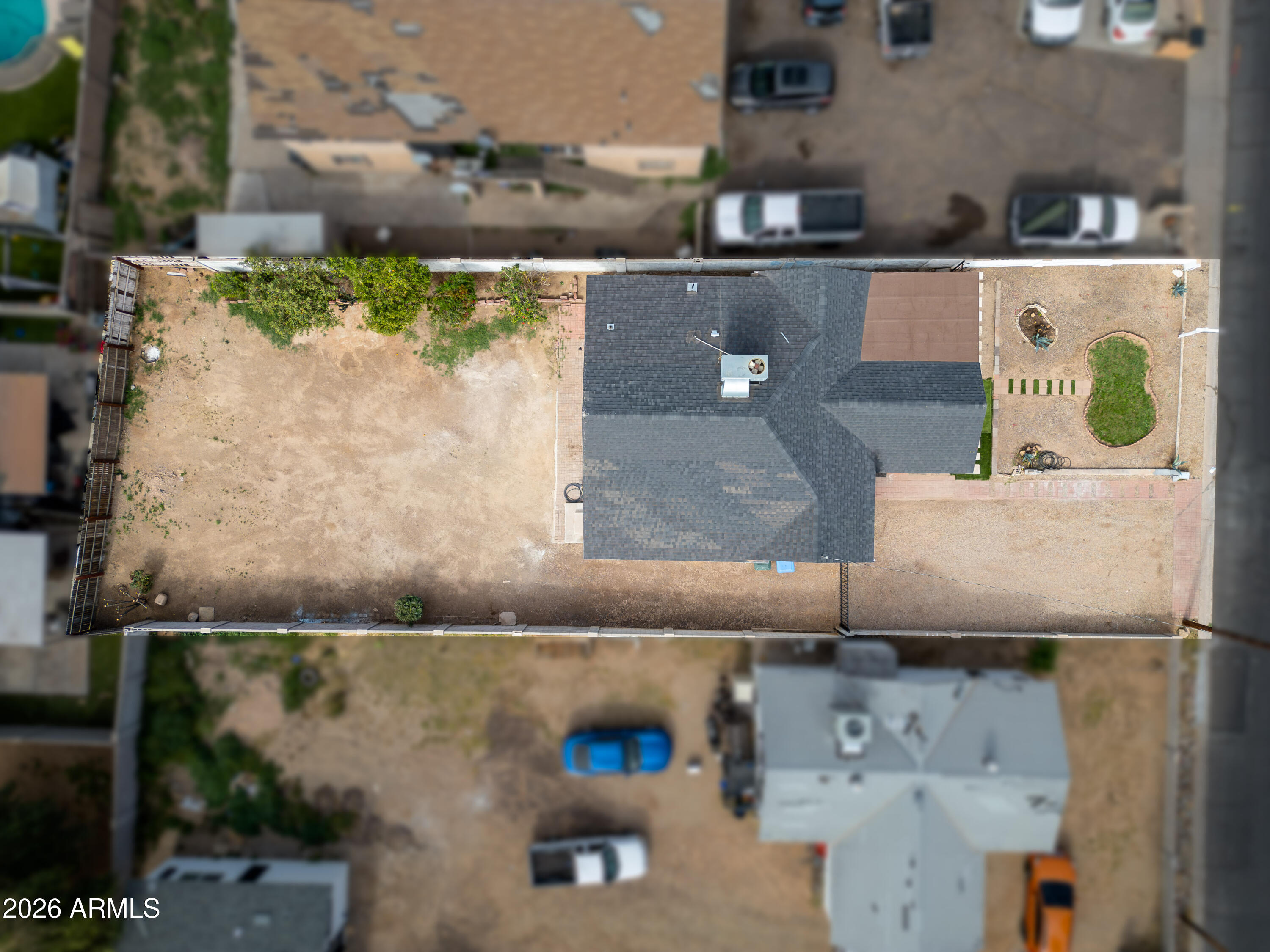 9616 North 11th Avenue Phoenix, AZ 85021 - Photo 2 of 32 an aerial view of a house with a yard