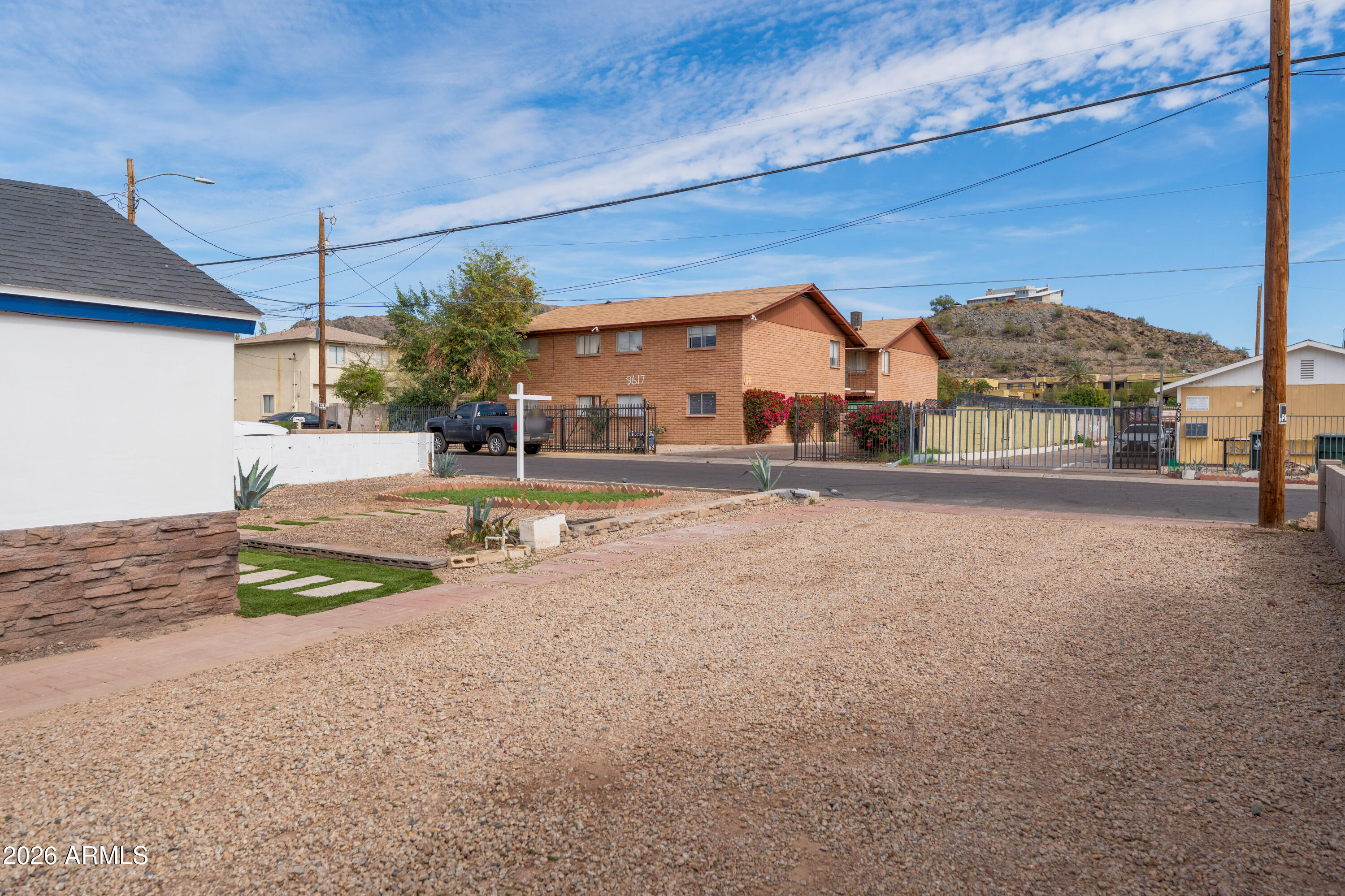9616 North 11th Avenue Phoenix, AZ 85021 - Photo 28 of 32 a view of a street with a building in the background