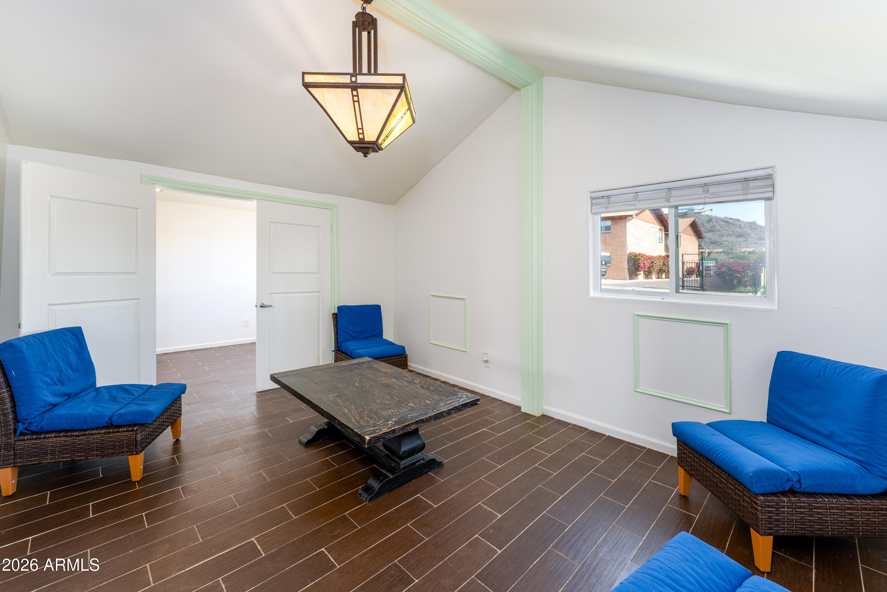 9616 North 11th Avenue Phoenix, AZ 85021 - Photo 5 of 32 a living room with furniture and a window