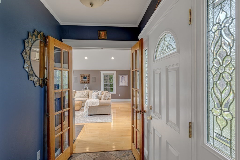 194 Washington Street Boxford, MA 01921 - Photo 13 of 35 a living room with furniture and a window