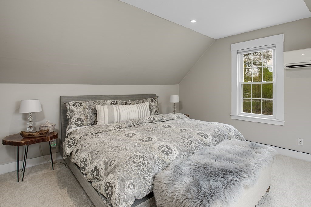 194 Washington Street Boxford, MA 01921 - Photo 23 of 35 a bedroom with a bed and window