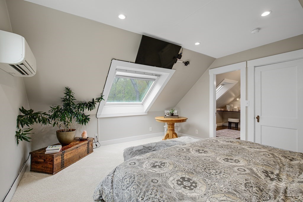 194 Washington Street Boxford, MA 01921 - Photo 24 of 35 a bedroom with furniture and a window