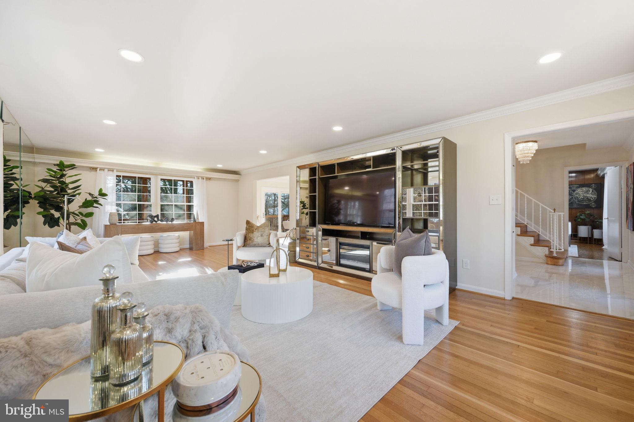 2827 Ellicott Street Northwest Washington, DC 20008 - Photo 22 of 56 a living room with furniture and a flat screen tv