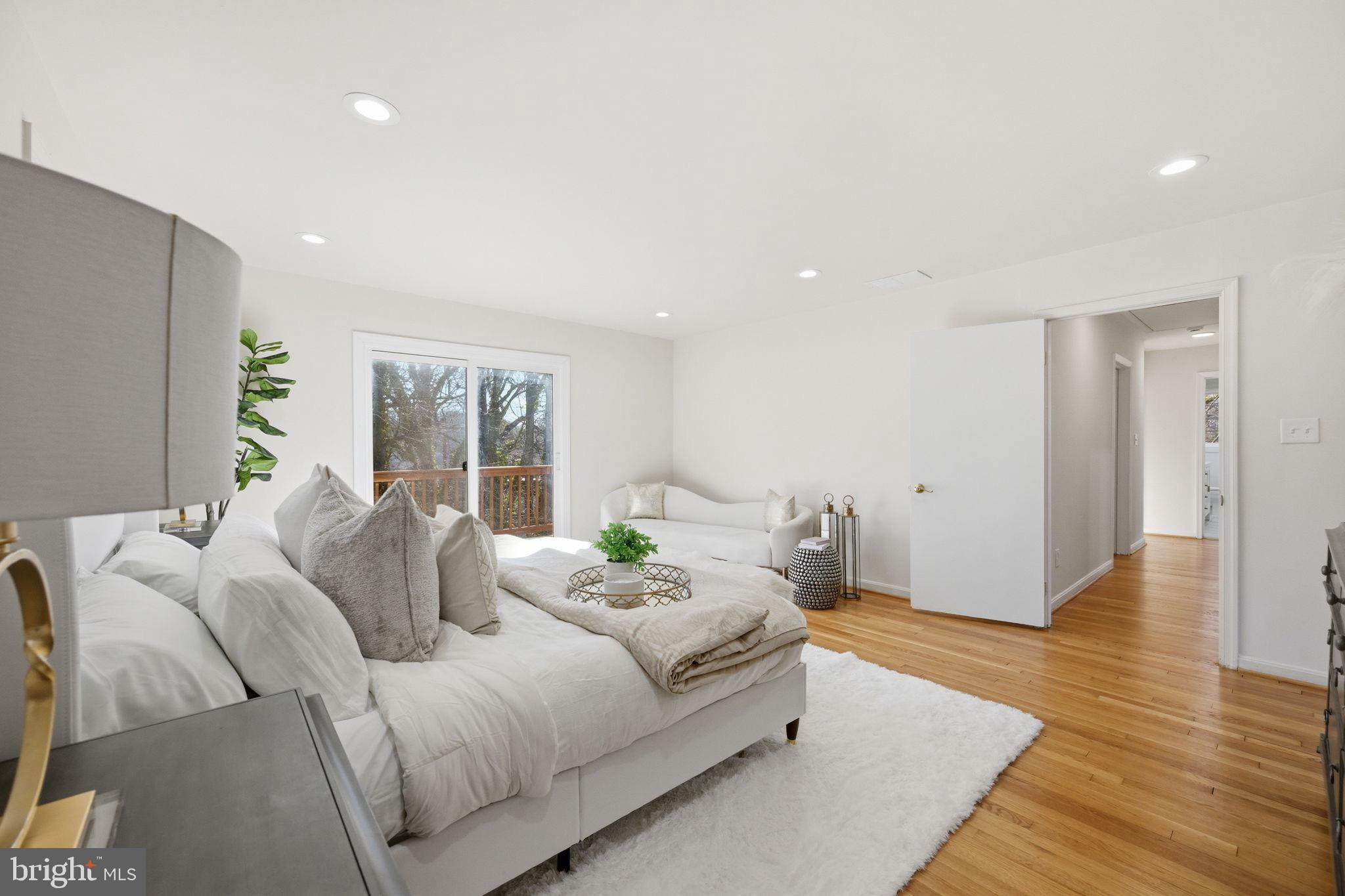 2827 Ellicott Street Northwest Washington, DC 20008 - Photo 27 of 56 a living room with furniture and a wooden floor
