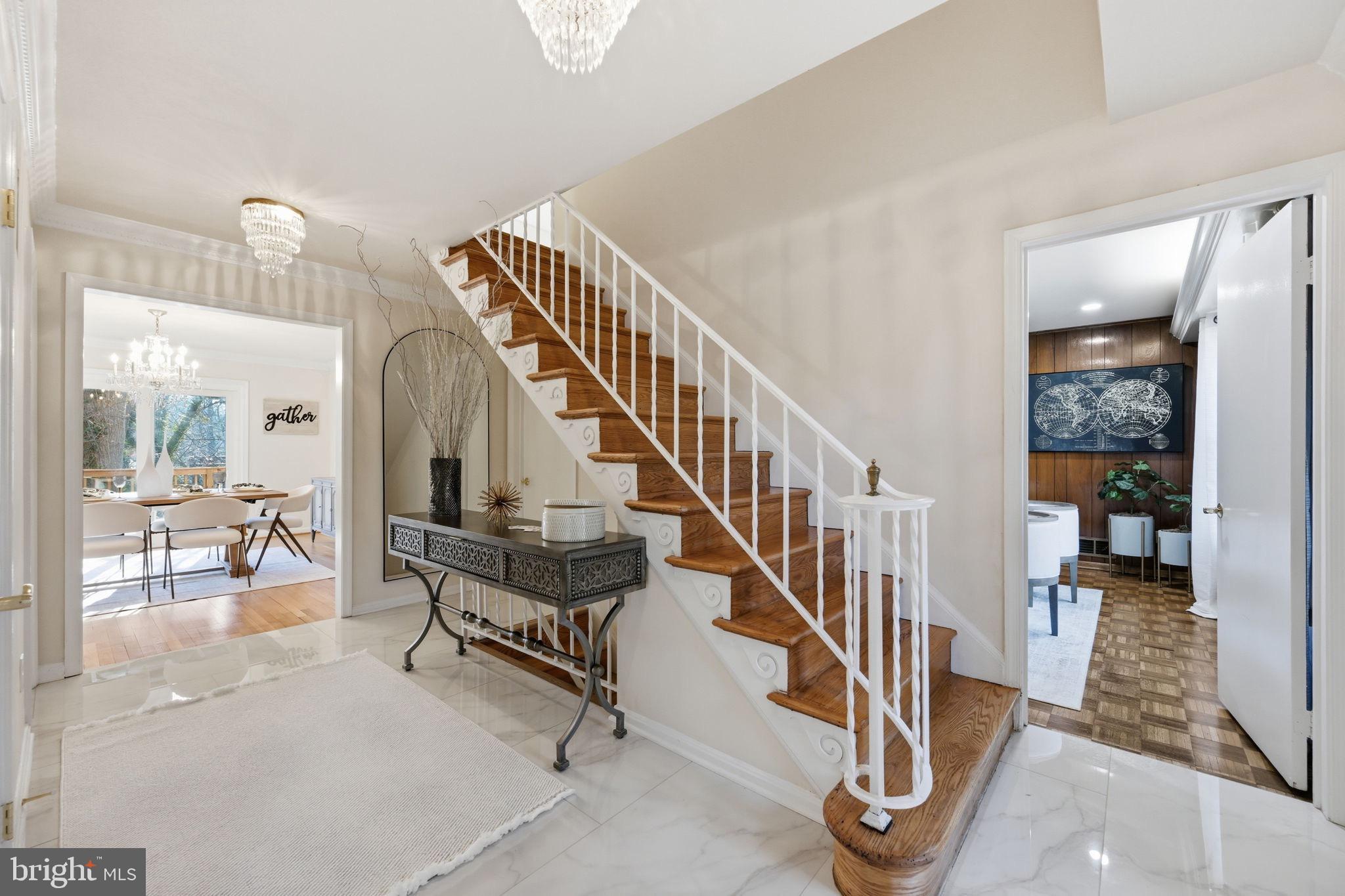 2827 Ellicott Street Northwest Washington, DC 20008 - Photo 3 of 56 a view of entryway and dining room with wooden floor