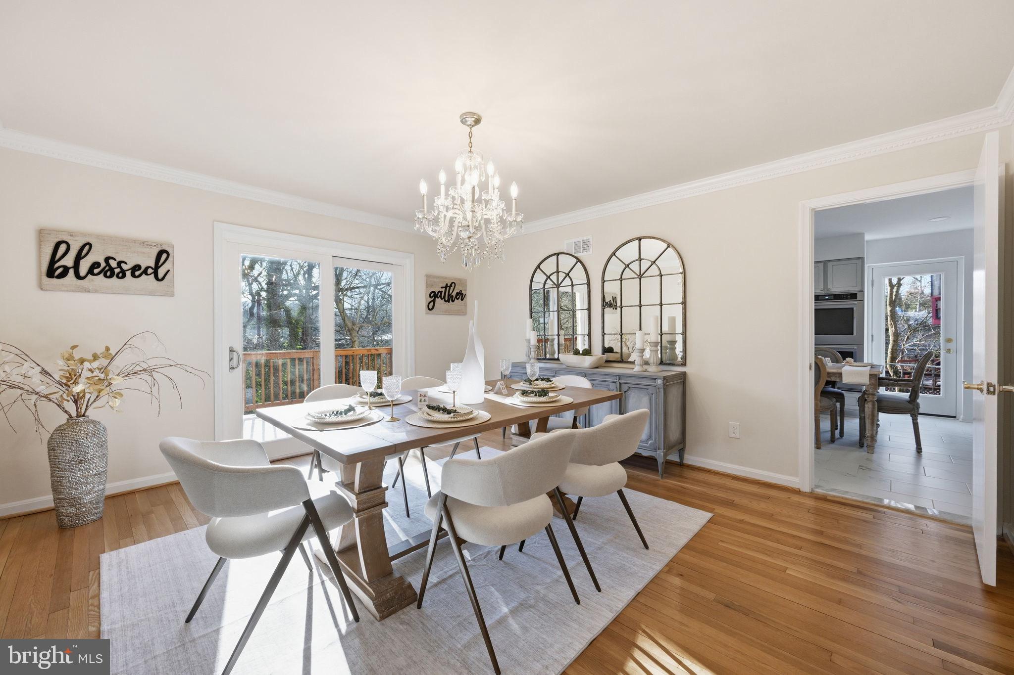 2827 Ellicott Street Northwest Washington, DC 20008 - Photo 6 of 56 a view of a dining room with furniture a chandelier and wooden floor