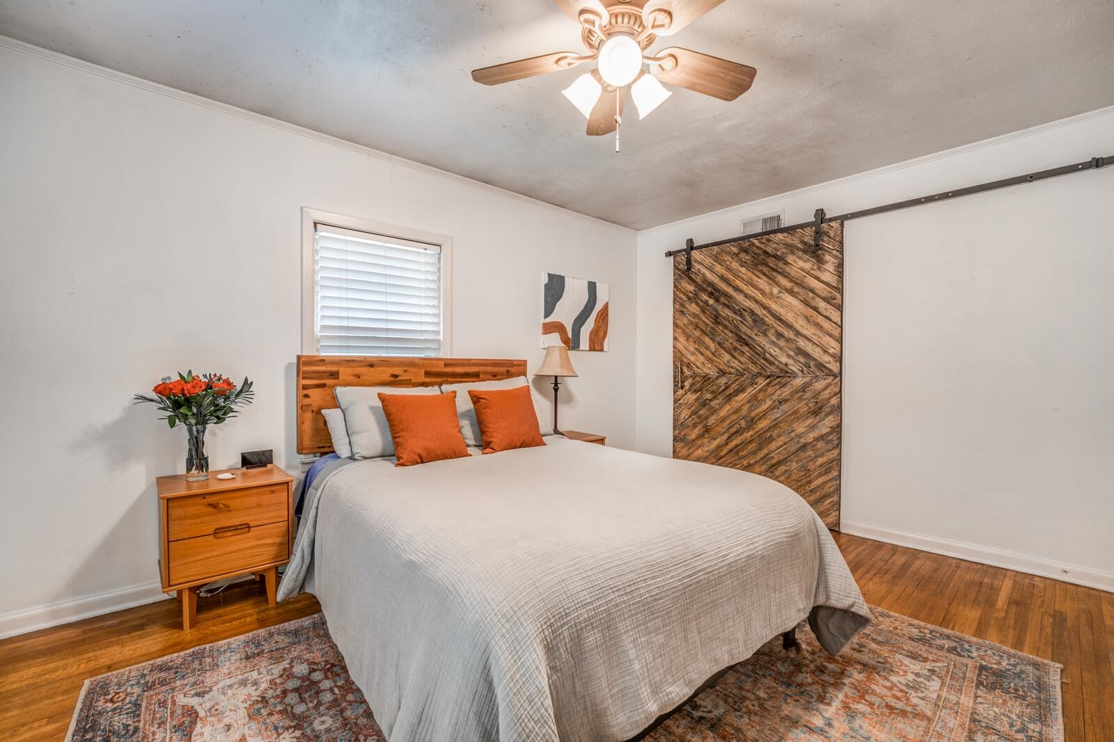 1297 Marcia Road Memphis, TN 38117 - Photo 6 of 32 a bedroom with a bed and a chandelier
