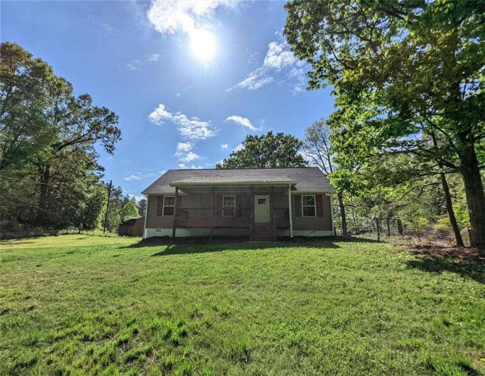 40 Bevil Ridge Road Southeast Emerson, GA 30137 - Photo 1 of 1 a view of a house with a yard