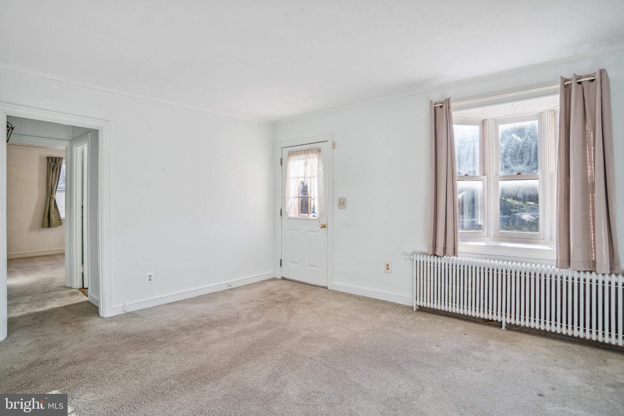 101 Melbourne Avenue Silver Spring, MD 20901 - Photo 12 of 30 Living room toward front door