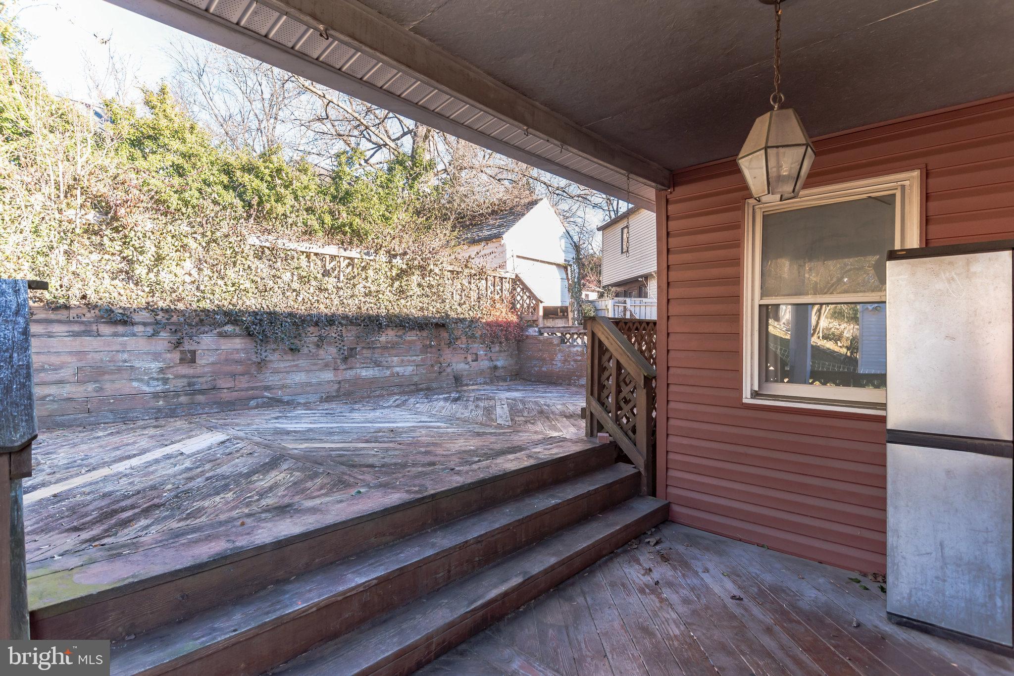 101 Melbourne Avenue Silver Spring, MD 20901 - Photo 27 of 30 Covered rear porch and deck