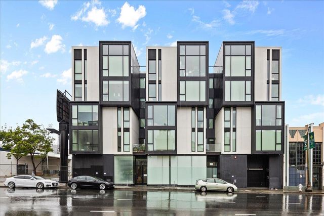 a front view of a building with street view