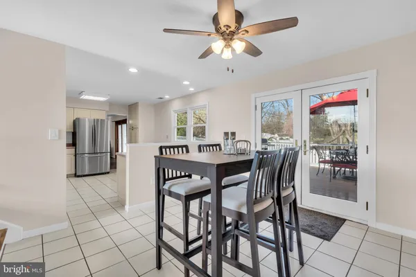 a view of a dining room and livingroom with furniture