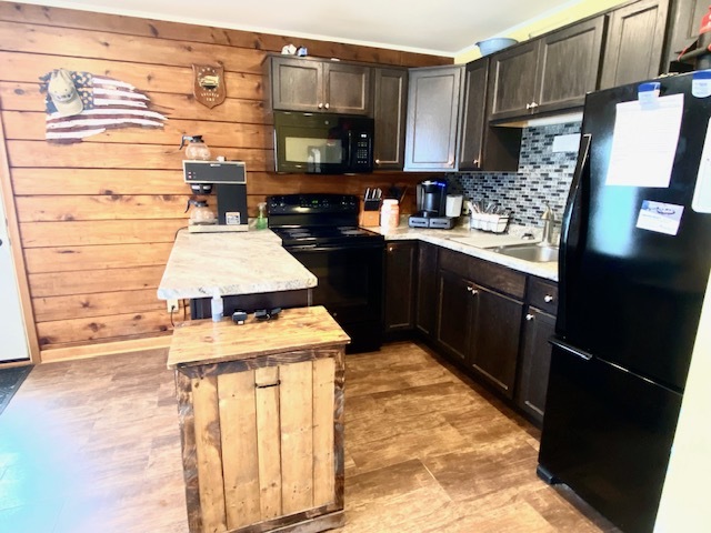 661 Reynoldswood Road Dixon, IL 61021 - Photo 13 of 21 a kitchen with a stove and a sink