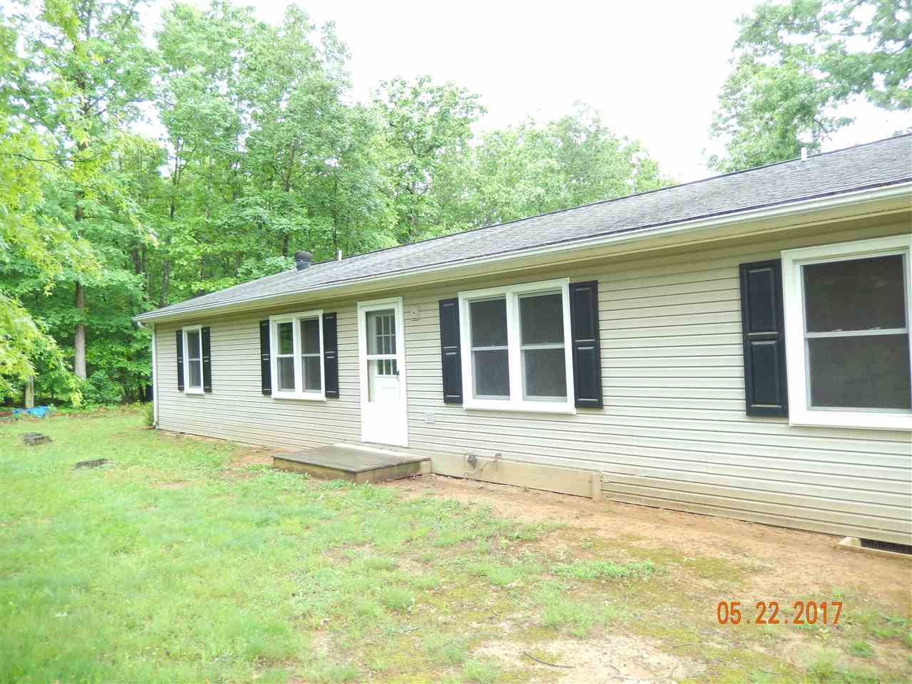 13010 Port Republic Road Grottoes, VA 24441 - Photo 2 of 11 a house that has a lot of windows in it