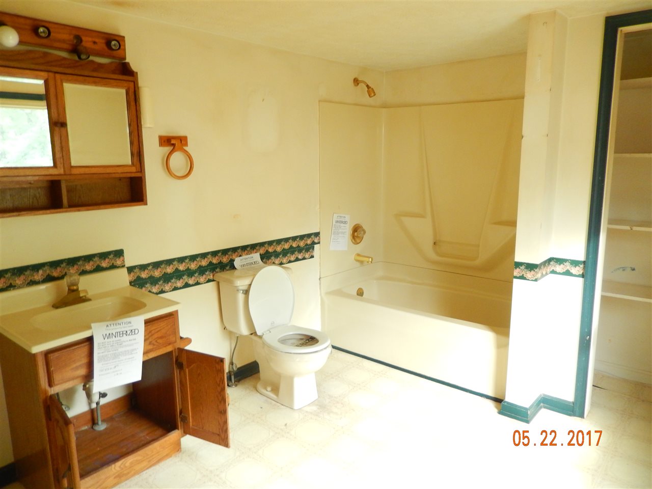 13010 Port Republic Road Grottoes, VA 24441 - Photo 7 of 11 a bathroom with a bathtub and a shower