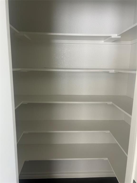 1821 Ferguson Lane McKinney, TX 75071 - Photo 12 of 26 a view of walk in closet with empty racks