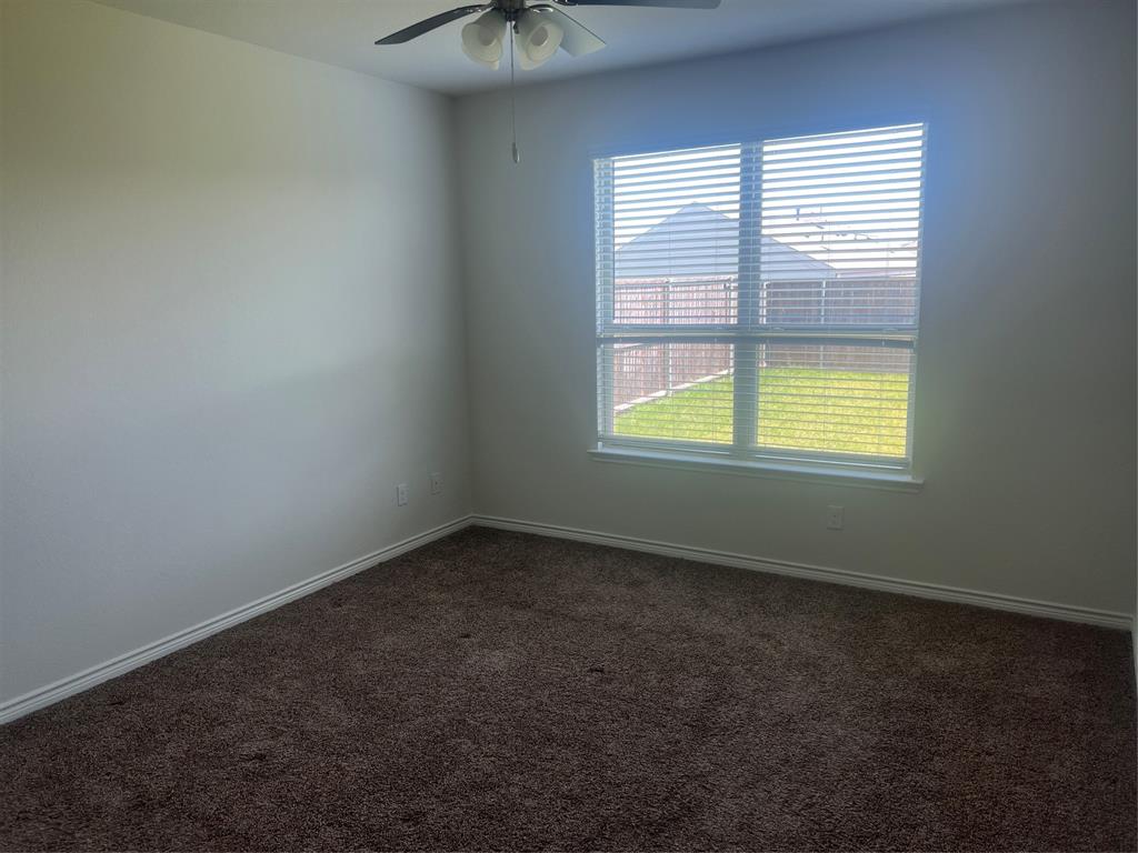 1821 Ferguson Lane McKinney, TX 75071 - Photo 13 of 26 an empty room with a window