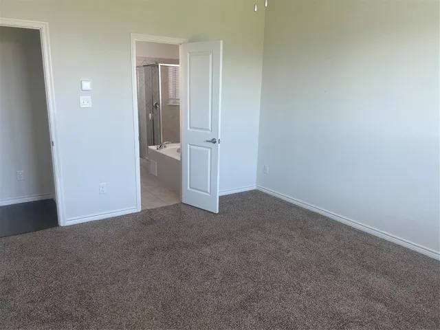 wooden floor and closet in a room