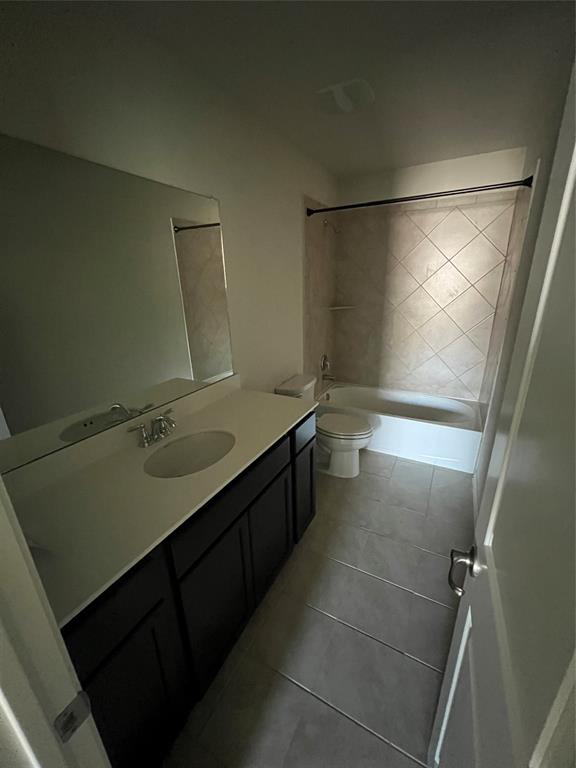 1821 Ferguson Lane McKinney, TX 75071 - Photo 22 of 26 a bathroom with a double vanity sink and mirror