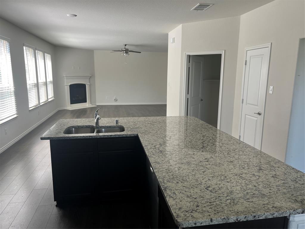 1821 Ferguson Lane McKinney, TX 75071 - Photo 10 of 26 a bathroom with a sink and a mirror