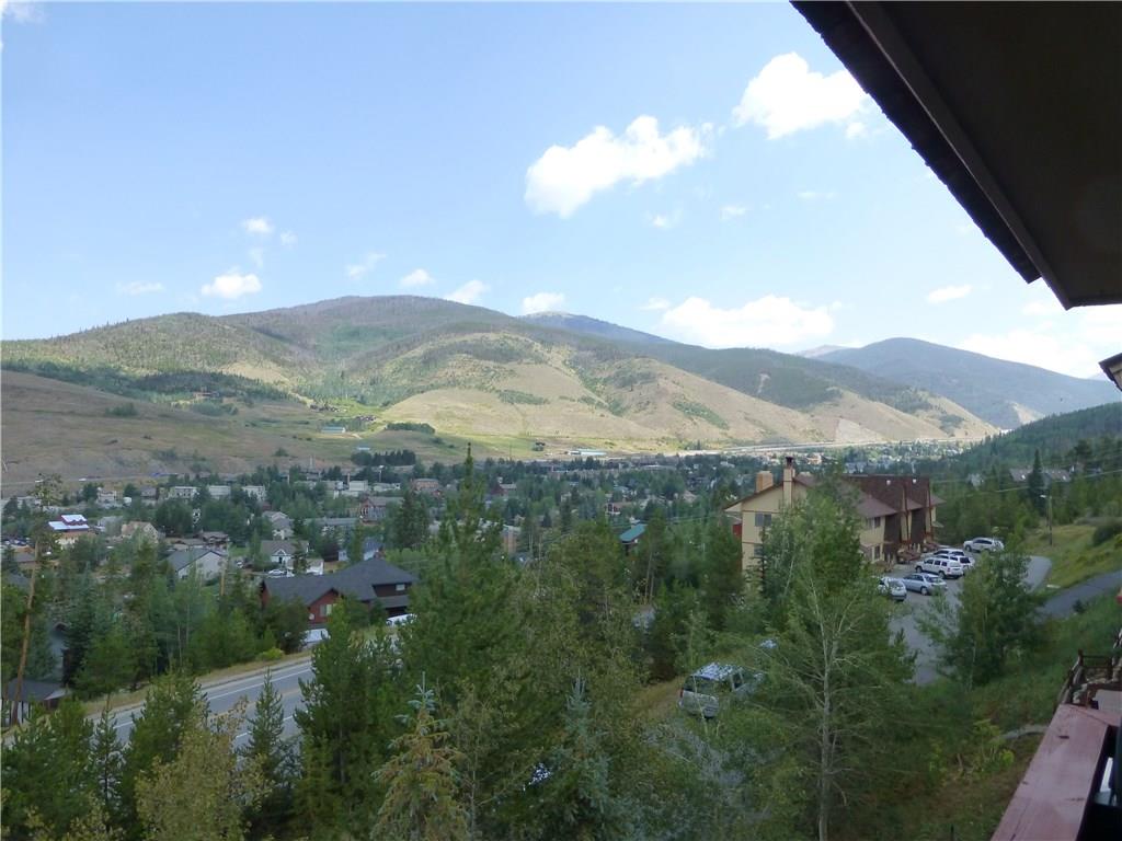 110 Evergreen Road, Unit B303 Dillon, CO 80435 - Photo 13 of 21 a view of a house with a mountain in the background