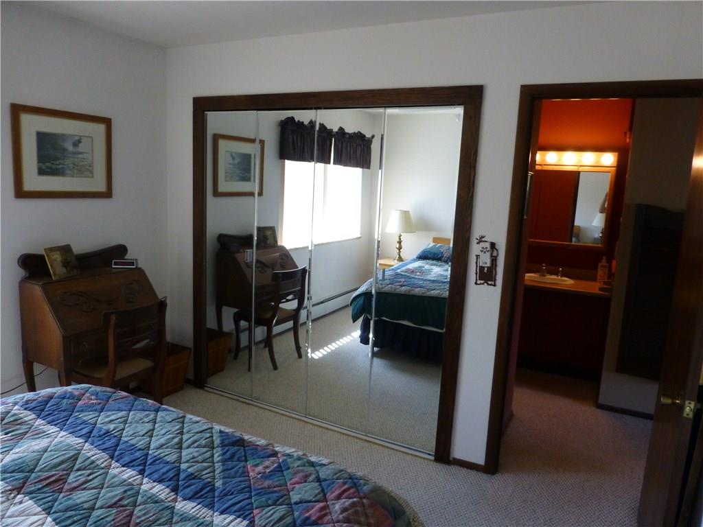 110 Evergreen Road, Unit B303 Dillon, CO 80435 - Photo 7 of 21 a bedroom with furniture and a window