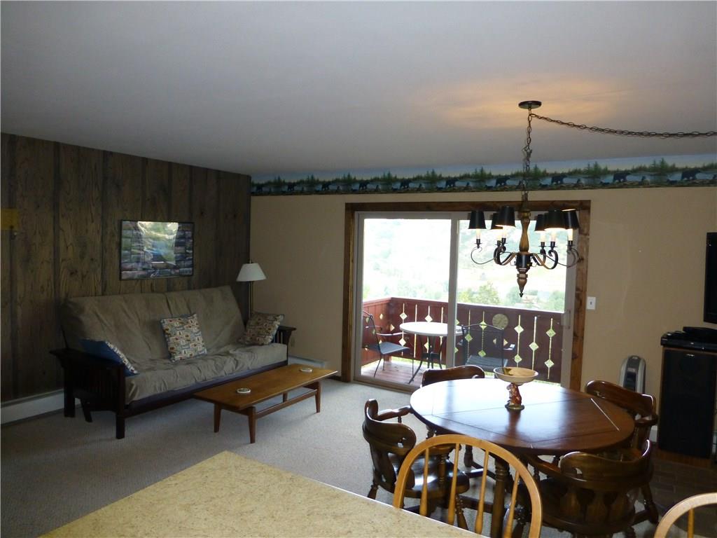 110 Evergreen Road, Unit B303 Dillon, CO 80435 - Photo 10 of 21 a living room with furniture and a window