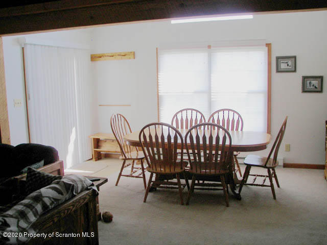 204 Scott Road Union Dale, PA 18470 - Photo 4 of 14 a bedroom with furniture and a window