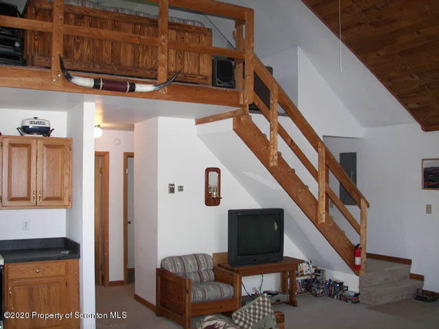 204 Scott Road Union Dale, PA 18470 - Photo 6 of 14 a living room with furniture and a fireplace