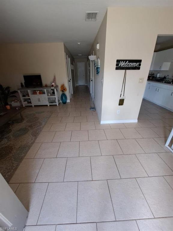 4204 34th Street Southwest Lehigh Acres, FL 33976 - Photo 4 of 8 a view of a storage & utility room