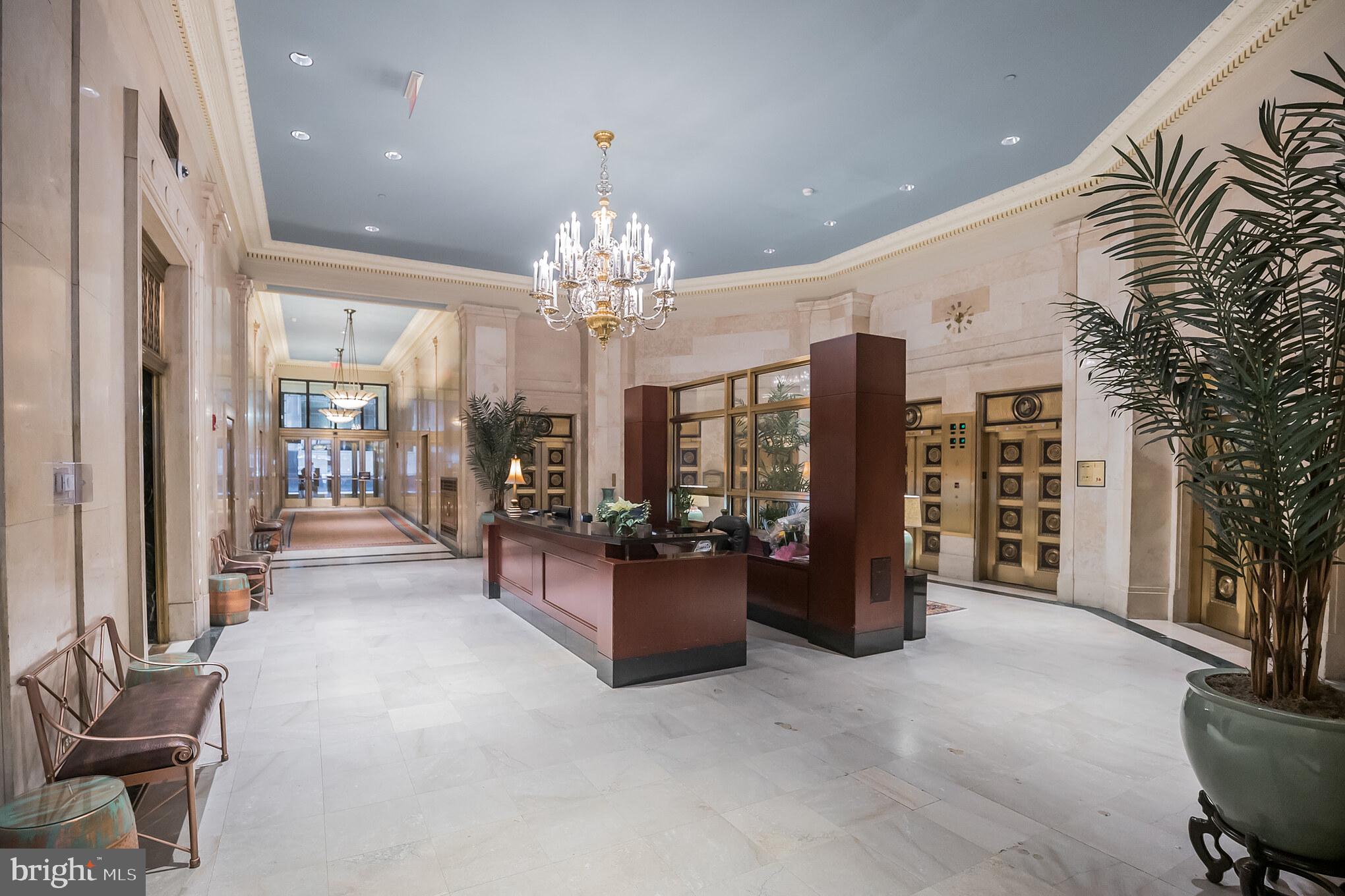 1600 Arch Street, Unit 1904 Philadelphia, PA 19103 - Photo 2 of 21 a lobby with furniture and chandelier