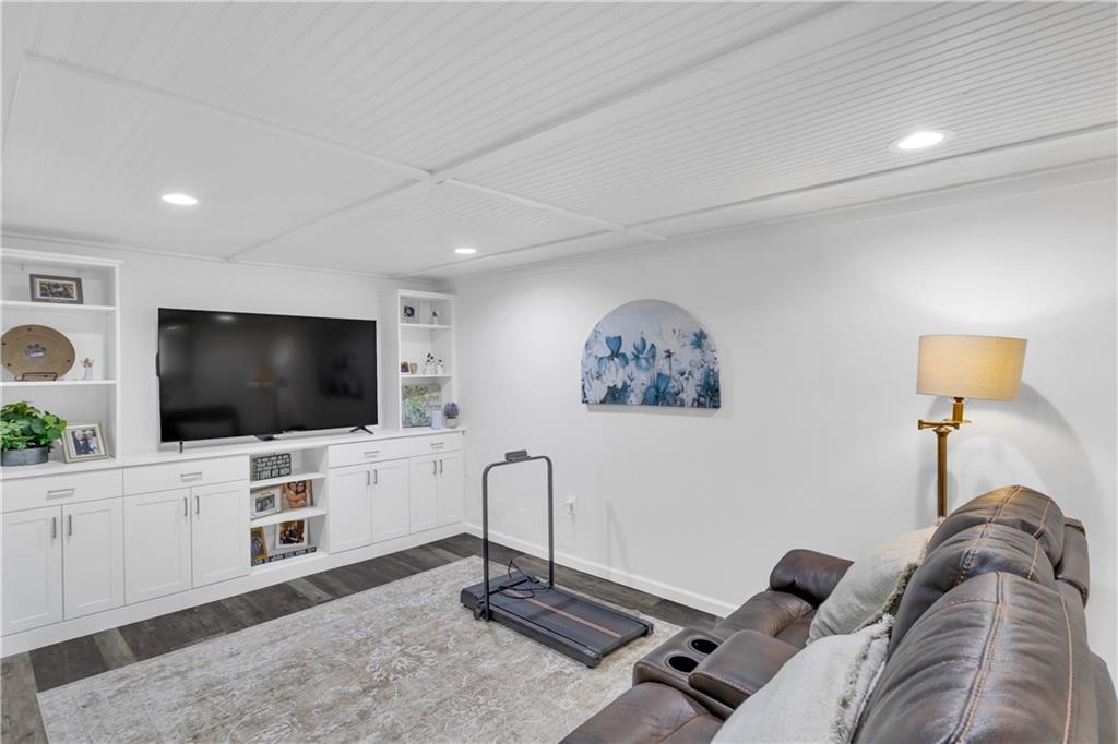 212 Seanor Road Irwin, PA 15642 - Photo 23 of 33 Custom Ceiling Detail and Built in, Soft Closet Shelving, Storage, Entertainment Area to Keep You Organized!